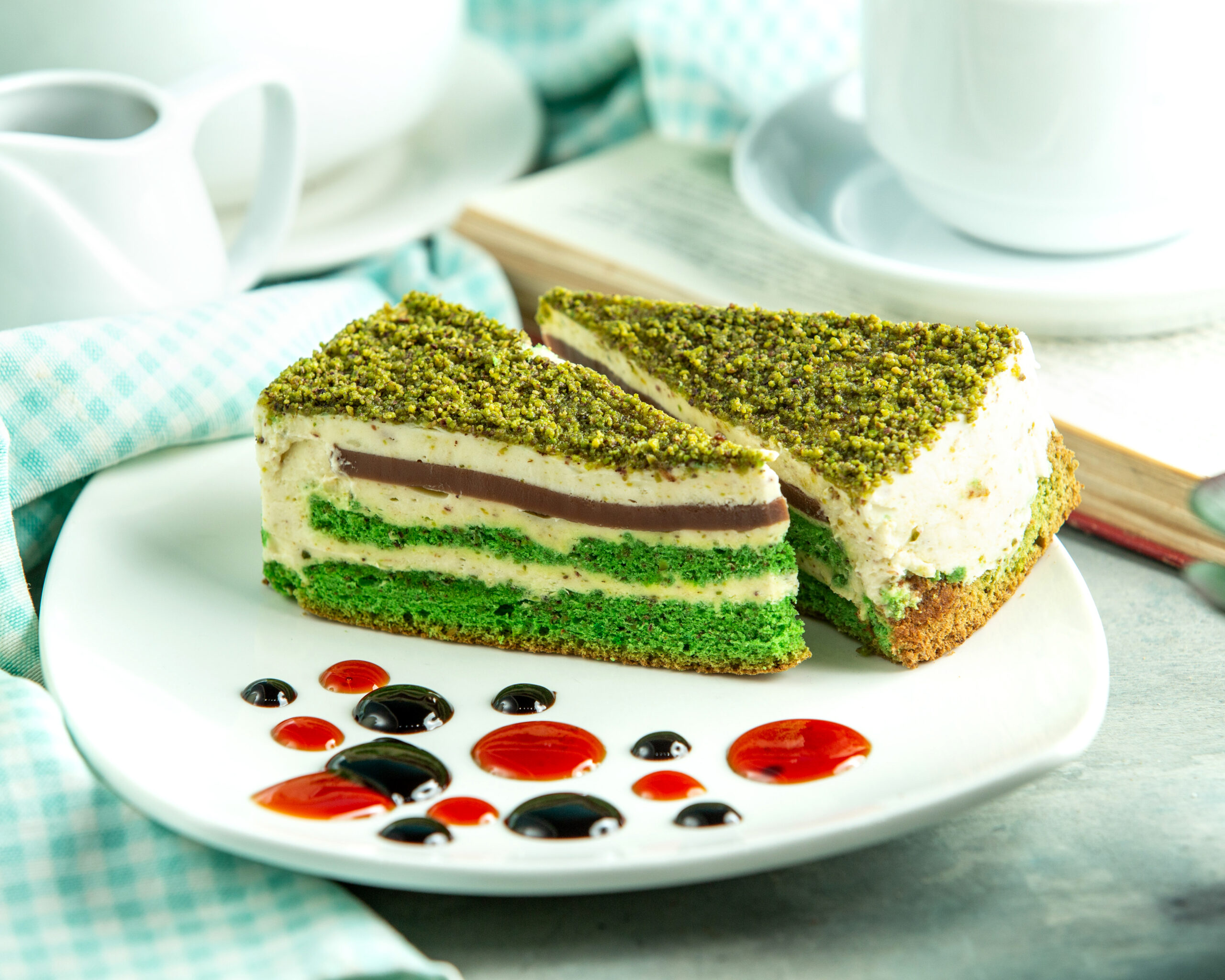 Marvin Coffee | front view pistachio cake with decor n plate scaled